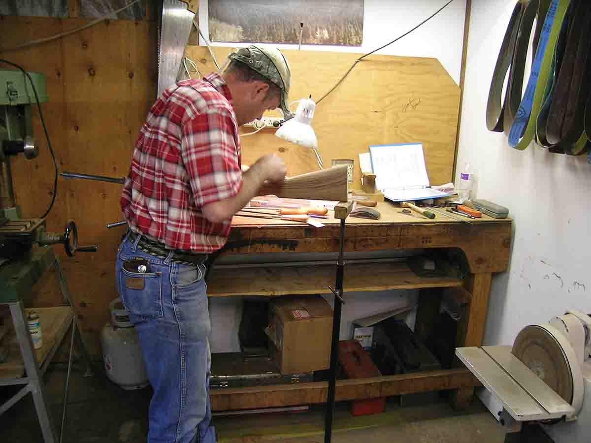 Irl Smith of Helena, MT shaping a stock during the Advanced Stockmaking clinic.